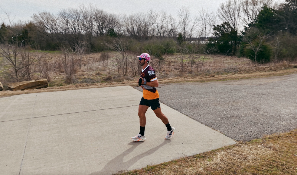 Lachlan Stuart running during the 58 marathon challenge