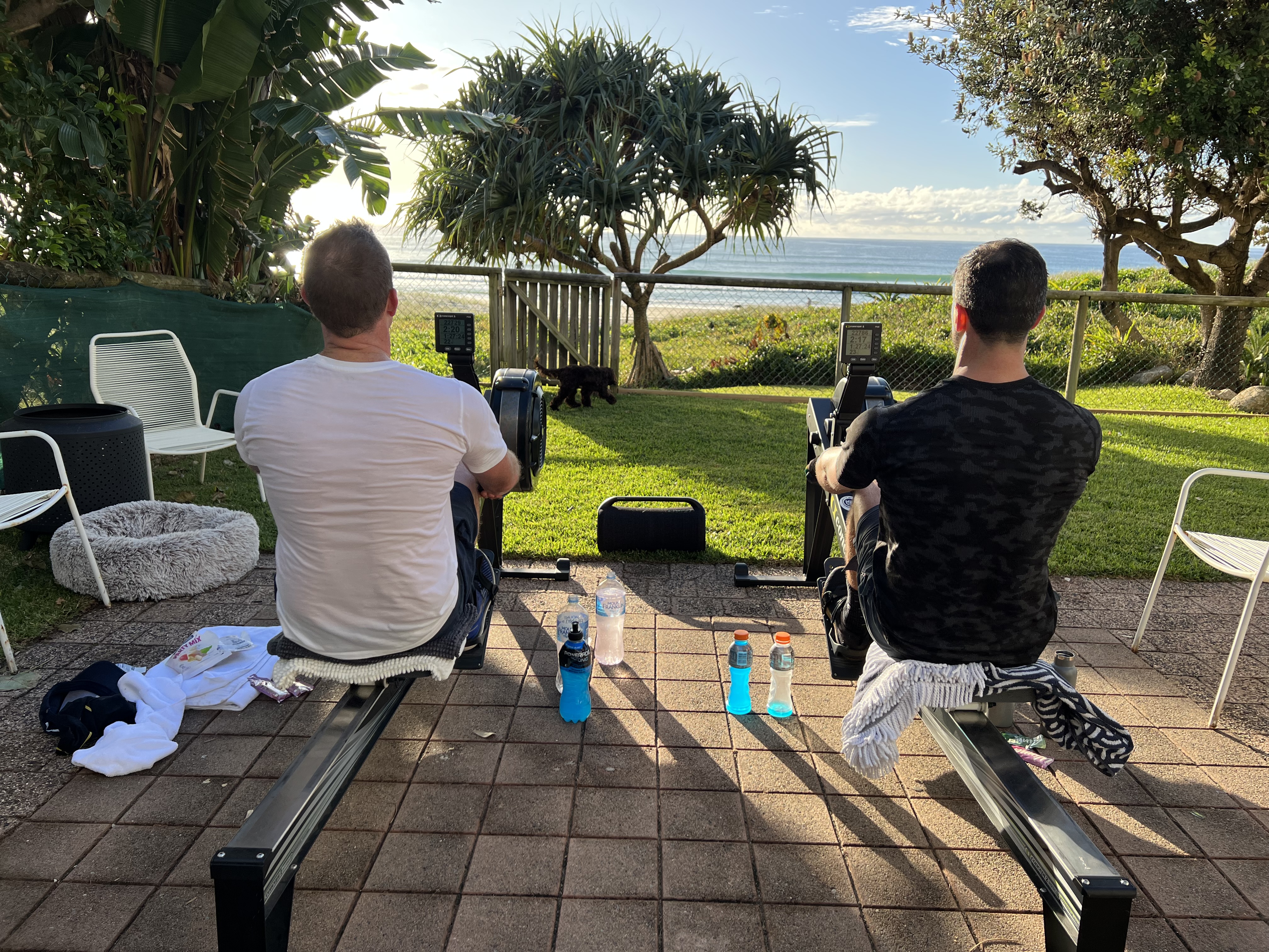 Lachlan Stuart and Matt Lancashire rowing at the beach: experiences in the bank that no income can replace